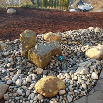 Patio, Walkway, and Creek Bed on Sloped Property in Bellingham