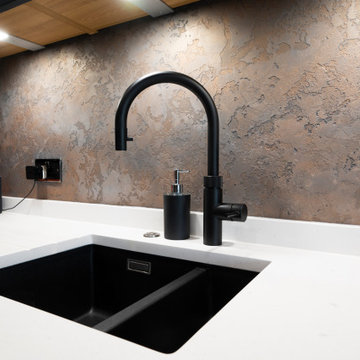 The decorative plasterwork is sealed to protect against splashing.