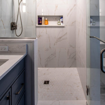 Primary Suite Remodel with Blue Cabinetry and Calacatta Miraggio Duo Quartz