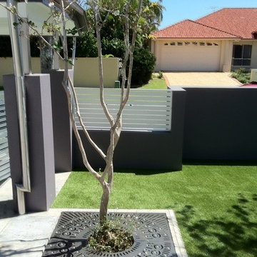Orbit Tree Grate with Light Port at a Private Residence