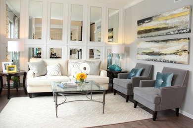 Inspiration for a contemporary open concept medium tone wood floor living room remodel in Detroit with gray walls