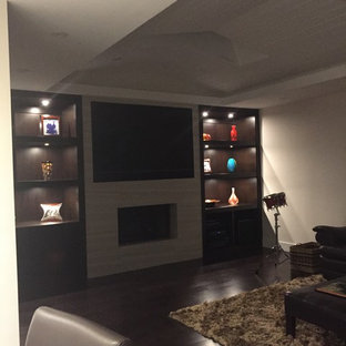 Inspiration for a medium sized contemporary enclosed home cinema in Miami with white walls, dark hardwood flooring and a wall mounted tv.