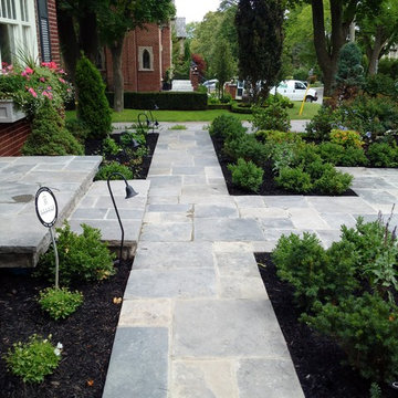 Traditional Home with Sprinkler System & Landscape