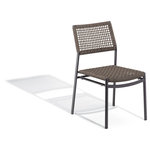 Oxford Garden - Eiland Side Chair, Carbon, Composite Cord Mocha, No Cushions, Set of 2 - With a subtle, sophisticated look, this Armless Dining Chair set complements a variety of spaces. Ideally suited for outdoor applications, these low-maintenance, durable chairs feature welded construction, durable yet lightweight powder-coated aluminum, and PVC-coated polyester composite cord. The open weave makes for an extremely comfortable seat and allows air to flow through, creating a lightweight seating solution that stays put in the windiest of conditions. Ideally suited for commercial applications, this versatile dining chair is the perfect complement to any outdoor space and conveniently stacks for easy storage. Add to your comfort and relaxation by pairing with coordinating Eiland Pepper Chair Pads.