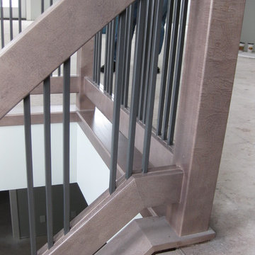 New Construction - Contemporary Maple Railings with Metal Spindles