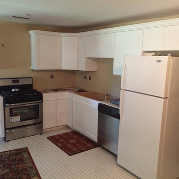 White Shaker Style Kitchen with Detailed Crown Molding