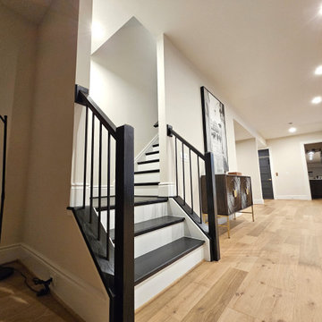 Project #130 | Curved Staircase with Wraparound Balcony