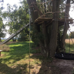 Tree-deck, Slide, Fireman's Pole and suspended Nest Swing - Products