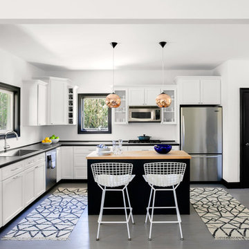 Existing millwork was painted white and black to brighten up the space.