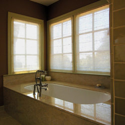Bathroom sheers allow for privacy but let light in - Roman Shades