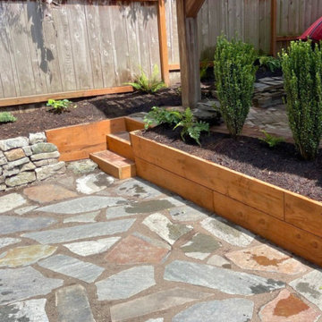 Sunken patio, wooden stairs and walls