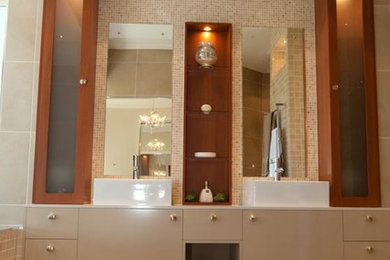 Photo of a mid-sized modern master bathroom in Sunshine Coast with beige tile, mosaic tile, laminate benchtops and ceramic floors.