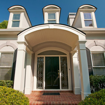 Two column arched portico with gable roof located in Marietta, GA