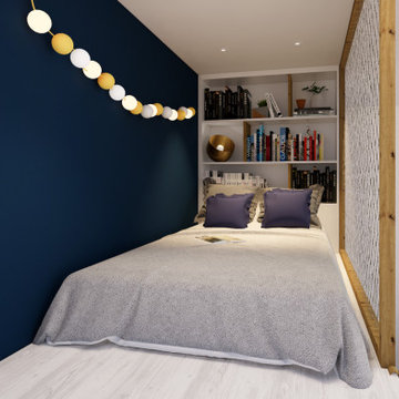 Chambre d'enfant bleue avec lit en mezzanine et dressing intégré