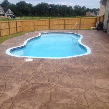 Vista Isle Fiberglass Pool with Stamped Concrete