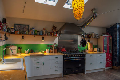 Mid-sized trendy home design photo in Dorset
