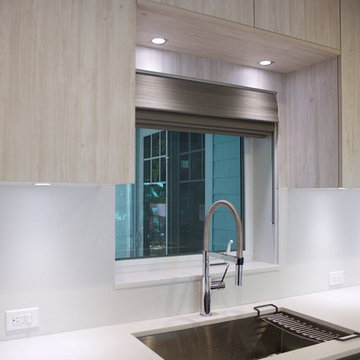 WALL PANELED WINDOW OVER METICULOUS SINK AREA