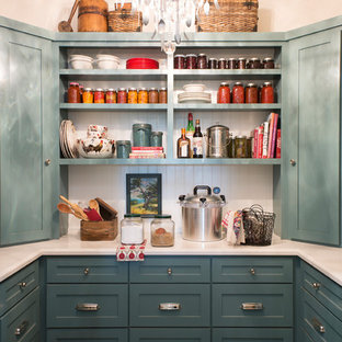 Farmhouse kitchen pantry ideas - Kitchen pantry - country u-shaped dark wood floor and brown floor kitchen pantry idea in Sacramento with shaker cabinets and blue cabinets