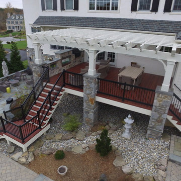 Zuri Deck with Cedar Pergola and Stone Fireplace with Grill