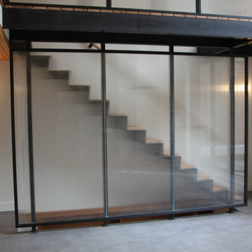 Glass and black metal railings