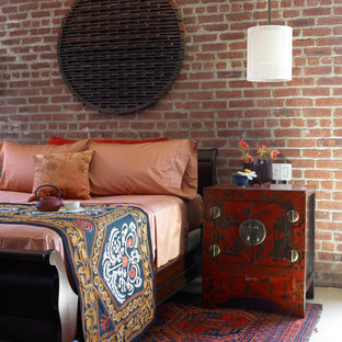 Ispirazione per una camera da letto stile loft etnica