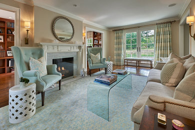Living room - large transitional formal and enclosed medium tone wood floor and brown floor living room idea in New York with beige walls, a standard fireplace, a stone fireplace and no tv