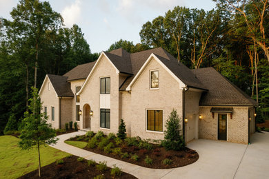 Example of a french country home design design in Atlanta