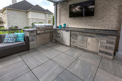 Example of a classic patio design in Cleveland