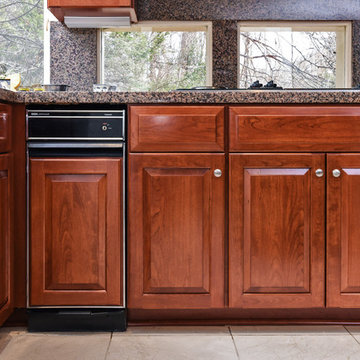 Cherry Kitchen with Contrast Island in Bethesda, MD