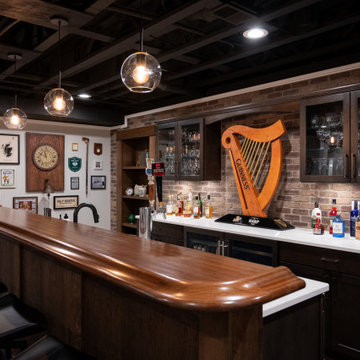 Finished Basement with Irish Themed Bar, Gym, Bathroom and Gamer Area in Canton,