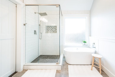 Inspiration for a mid-sized master porcelain tile and double-sink bathroom remodel in Dallas with blue cabinets, white walls, granite countertops, a hinged shower door, gray countertops and a built-in vanity