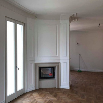 BOISERIE BIANCA CON CAMINO BIFACCIALE