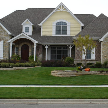 Batavia French Colonial Landscape with year round color and natural flagstone wa