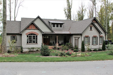 Example of an arts and crafts exterior home design in Other
