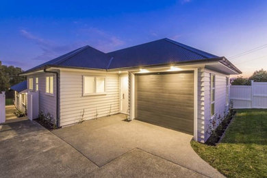This is an example of a contemporary garage in Auckland.