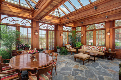 Inspiration for a timeless stone porch remodel in DC Metro with a roof extension