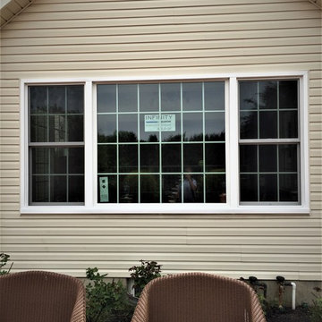 Adobe Cream Siding and Marvin Infinity Windows Installed in Manalapan, NJ