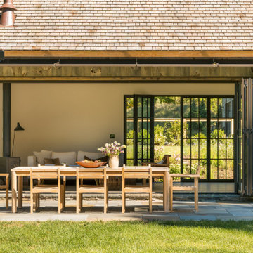 Barn-Inspired ADU & Guest Cottage in NY with NanaWall Steel Effect Doors