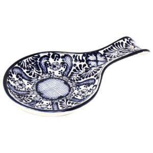 light blue teaspoon rest with stripped or circular patterns