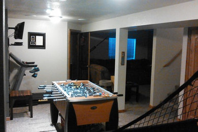 Example of a classic basement design in Other