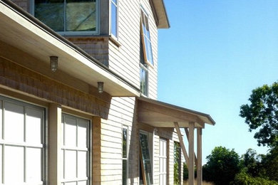 Mid-sized trendy two-story wood exterior home photo in Providence
