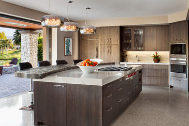 Example of an island style kitchen design in Other