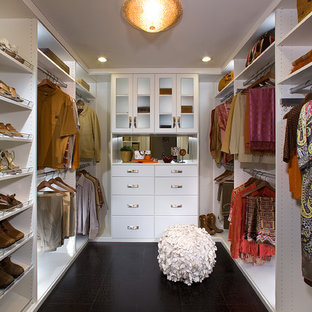 Inspiration for a small contemporary gender-neutral walk-in closet remodel in Los Angeles with flat-panel cabinets and white cabinets