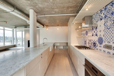 Mid-sized industrial kitchen in Vancouver.