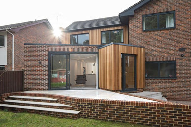 This is an example of a mid-sized contemporary home design in Dorset.