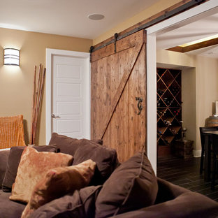Photo of a medium sized eclectic fully buried basement in Chicago with beige walls, carpet, no fireplace and black floors.