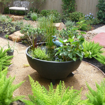 Contemporary grassless landscape in West University
