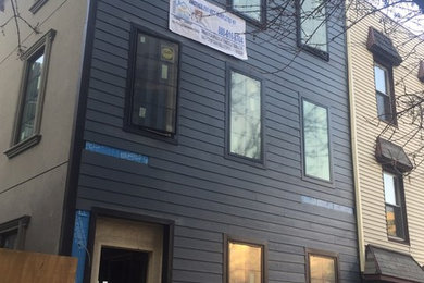 Example of an exterior home design in New York