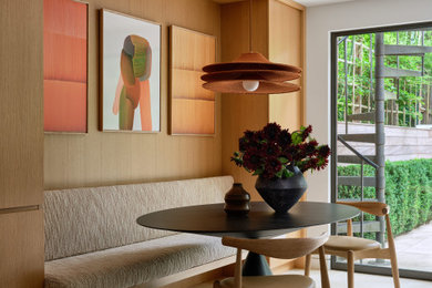 Example of a trendy dining room design in New York