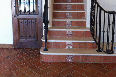 Example of a tuscan staircase design in Orange County